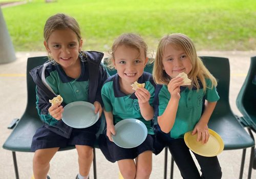 Children Smiling While Eating — Vacation Care in Newcastle